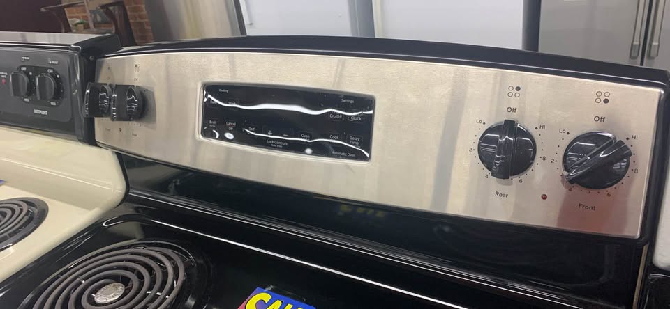 Used GE Stainless steel & black Stove - Woo Town Furniture (Worcester,MA)