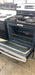 Used GE Stainless steel & black Stove - Woo Town Furniture (Worcester,MA)