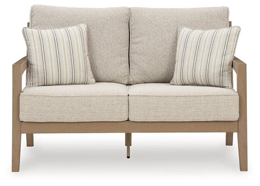 Hallow Creek Outdoor Loveseat with Cushion - Woo Town Furniture (Worcester,MA)