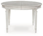 Montelaine Dining Extension Table - Woo Town Furniture (Worcester,MA)