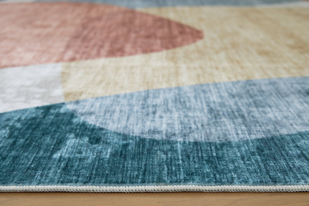 Chanleigh Washable 5' x 7' Area Rug - Woo Town Furniture (Worcester,MA)