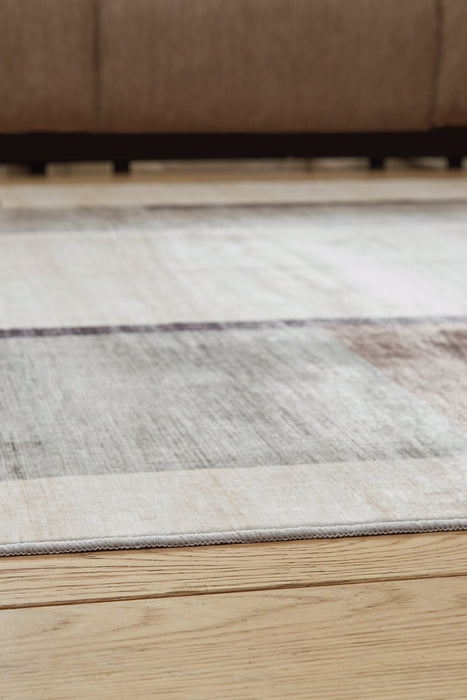 Larkport Washable Area Rug - Woo Town Furniture (Worcester,MA)